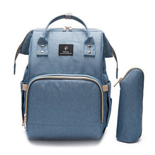 Spacious Diaper Bag blue backpack with a front organizer pocket for quick-grab baby essentials.