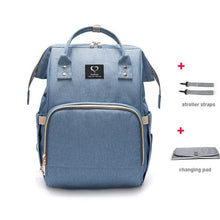 Blue USB Large Capacity Nappy Bag with stroller straps for convenient pram carrying during walks and errands.