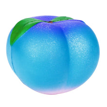 Blueberry squishy toy with a green leaf for fruit learning play and calming hand squeezes.