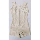 Beige bodysuit with lace trim on a light gray background