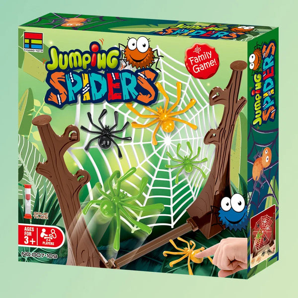 Spider game box showing a spider web on a tree-trunk frame with a finger pressing an orange spider