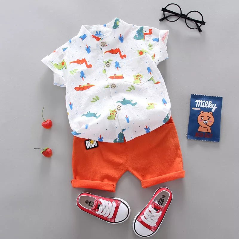 Children's outfit with a cartoon-patterned shirt, orange shorts, red sneakers, and a small bag.