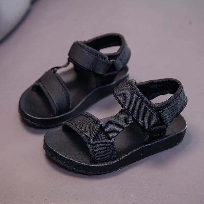 Boys and girls summer gladiator sandals tread pattern for anti-slip outdoor traction.