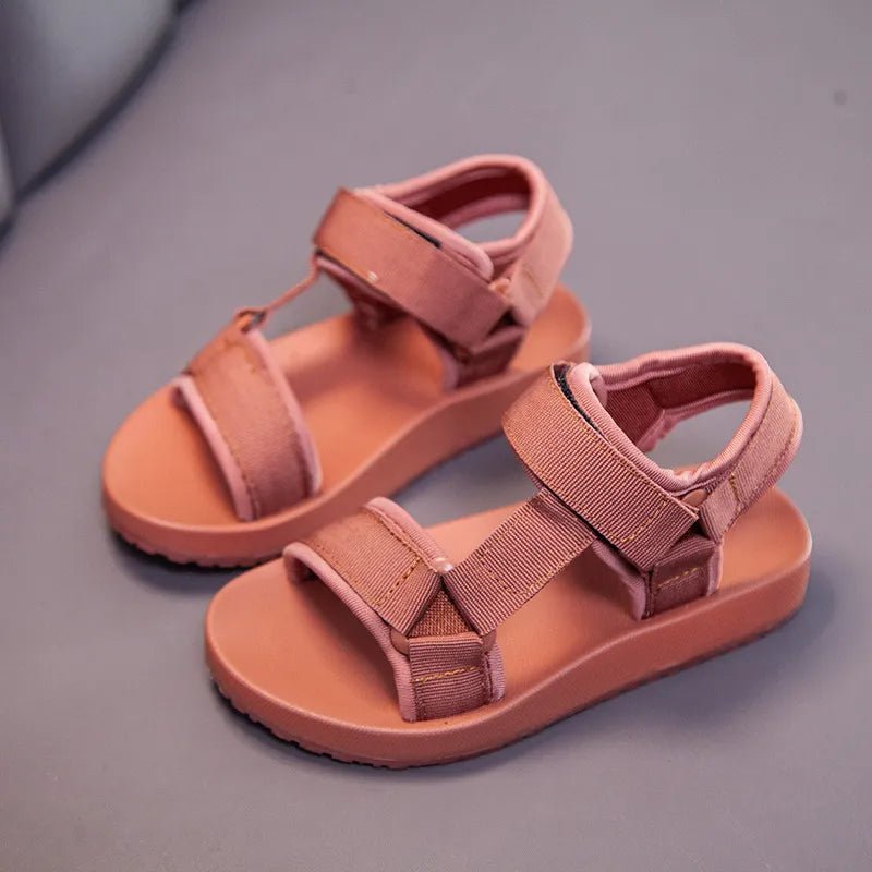 Boys and girls summer gladiator sandals worn for a casual outdoor outing.