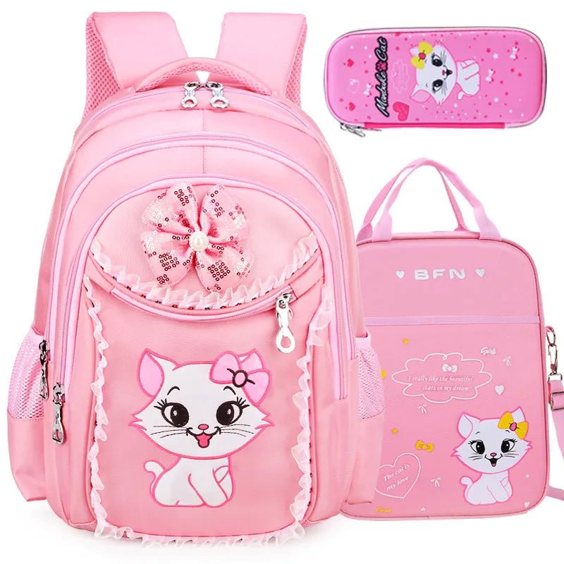 Pink backpack, lunch bag, and pencil case with cartoon cat design.