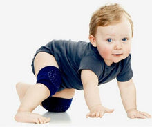 Breathable blue baby knee pad worn by a crawling baby for cool, comfortable knee protection during play.