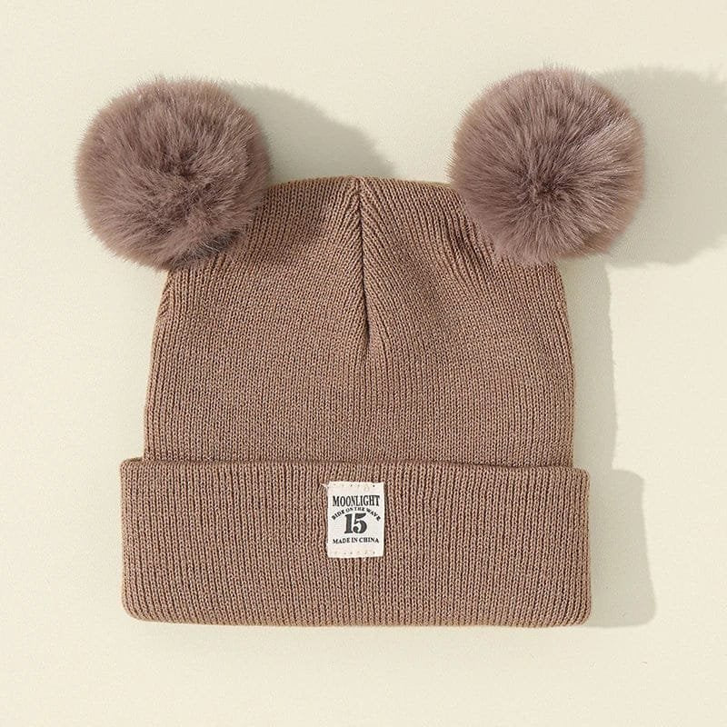 Brown Warm Knitted Baby Beanie with fluffy pom poms for soft winter warmth during pram naps and walks.