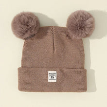 Brown Warm Knitted Baby Beanie with fluffy pom poms for soft winter warmth during pram naps and walks.