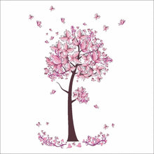 Design detail of the butterfly and blossom tree wall decal used to brighten nursery walls without paint.