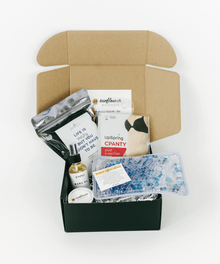 Open the box containing various items, including a bottle, a jar, and a box.