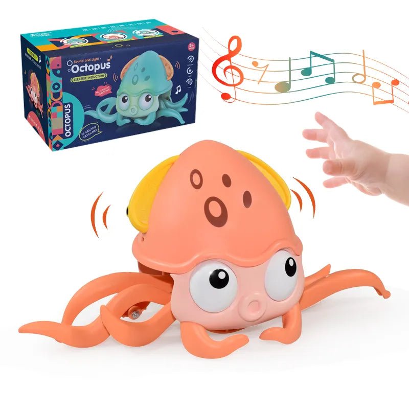 Toy octopus with music notes, packaging, and a hand reaching towards it on a white background