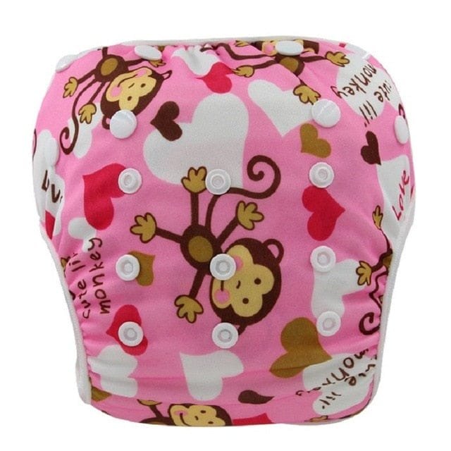 Pink diaper with monkey and heart pattern on a white background