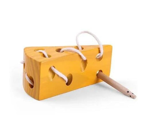 Yellow wooden block with holes and a stick on a white background