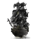 Black pirate ship model on a white background