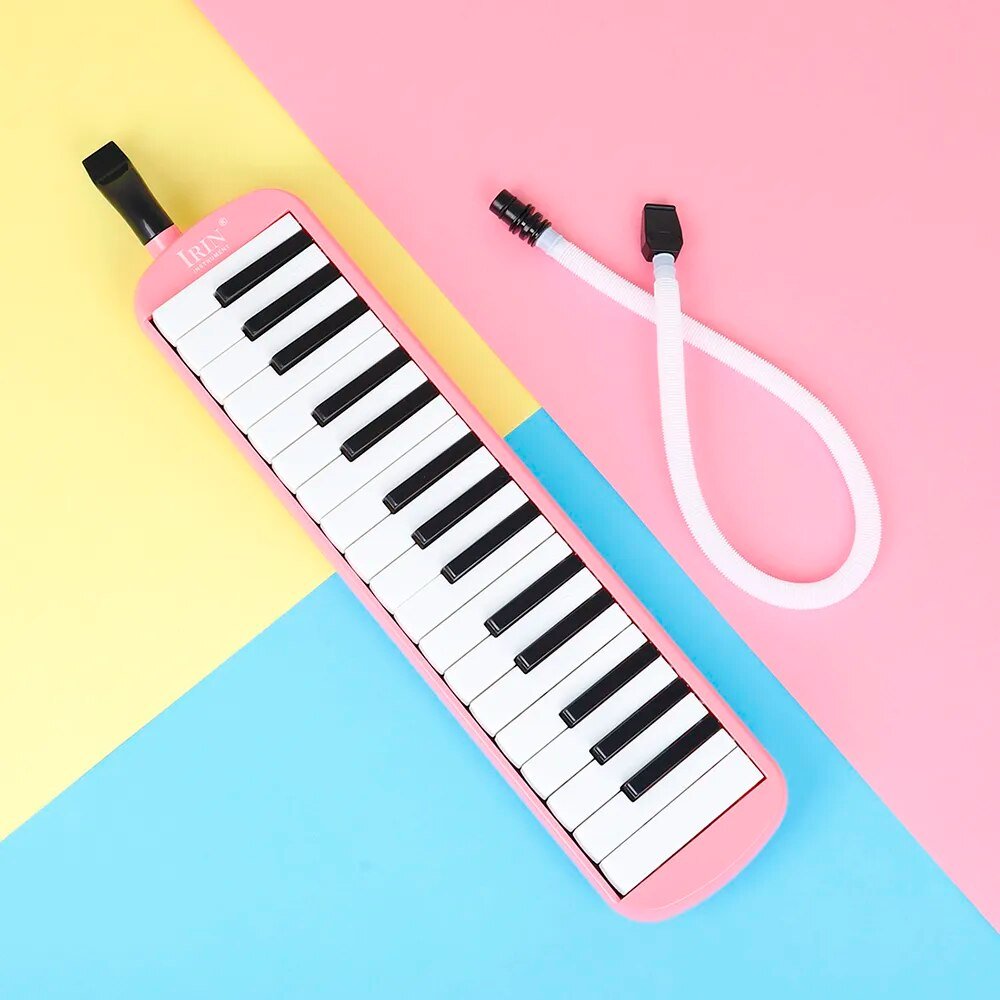 Pink and black melodica on a colorful background