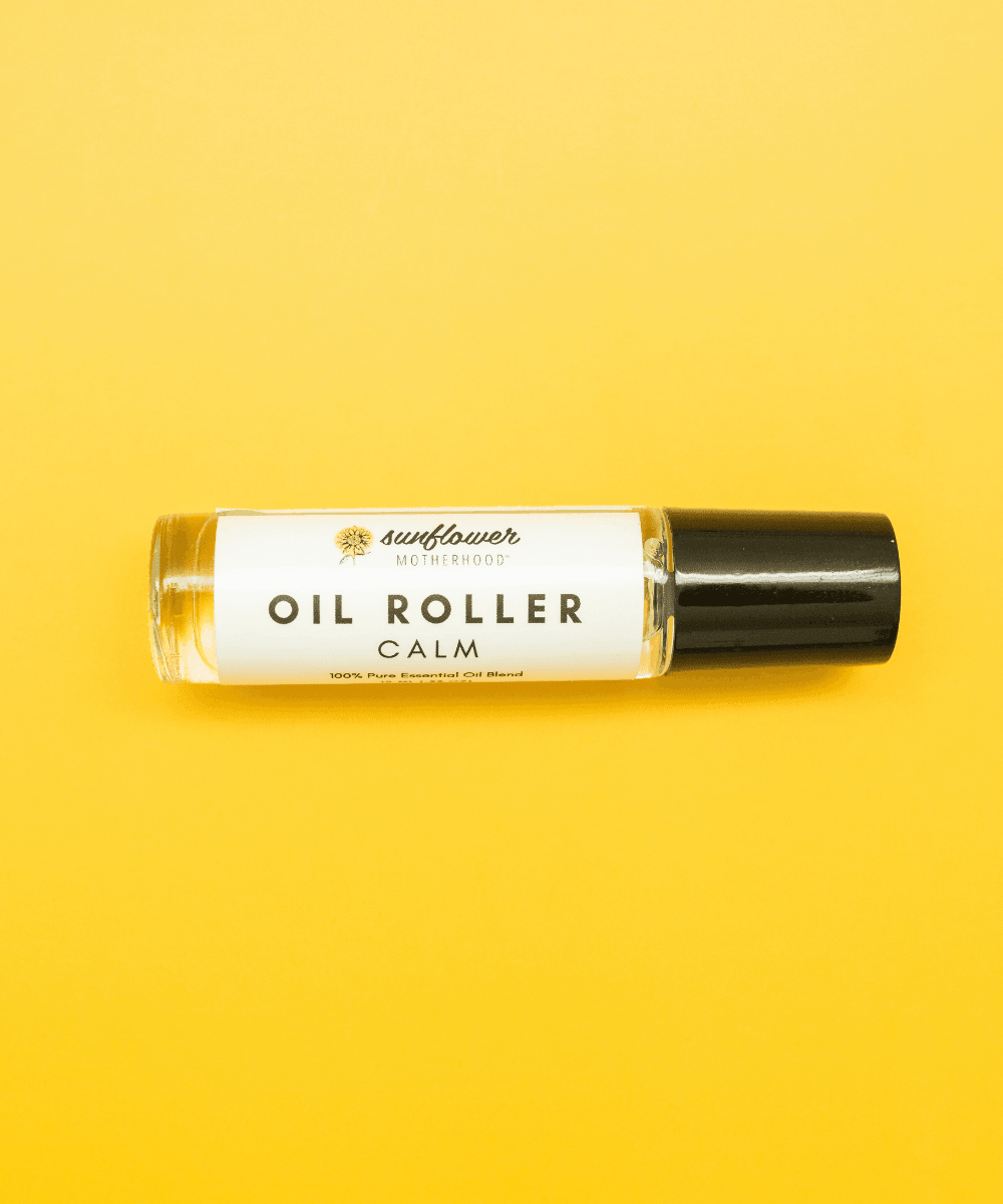 Calm essential oil roller bottle labeled for soothing aromatherapy use.