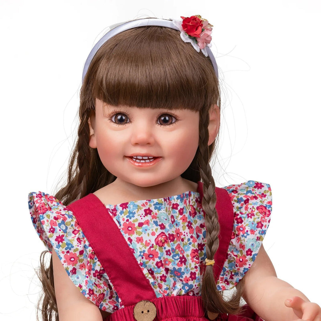 Cammi Smile 3D Reborn Doll in soft silicone with a floral dress and headband for dress-up play, styling, and gifting.