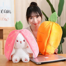 Carrot Rabbit in Strawberry Bag soft plush toy held in hand for cuddling, imaginative play, and kids gifting.