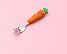 Carrot-shaped baby fork utensil shown in side view for toddler self-feeding.