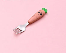 Carrot-shaped baby fork shown standalone for easy toddler self-feeding.