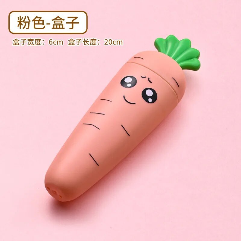 Carrot-shaped baby tableware container face design shown up close for toddler mealtime.