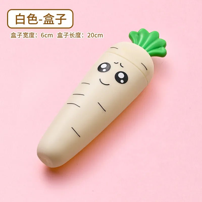 Carrot-shaped baby tableware container smiling face design shown from a side angle.