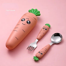 Carrot-shaped baby tableware container holding a fork and spoon for organized mealtime storage.