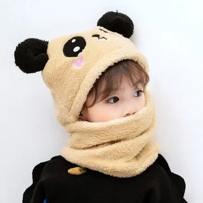 Child wearing a beige bear-themed hood and scarf 