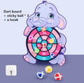 Dart board with elephant design, three sticky balls, and a hook.