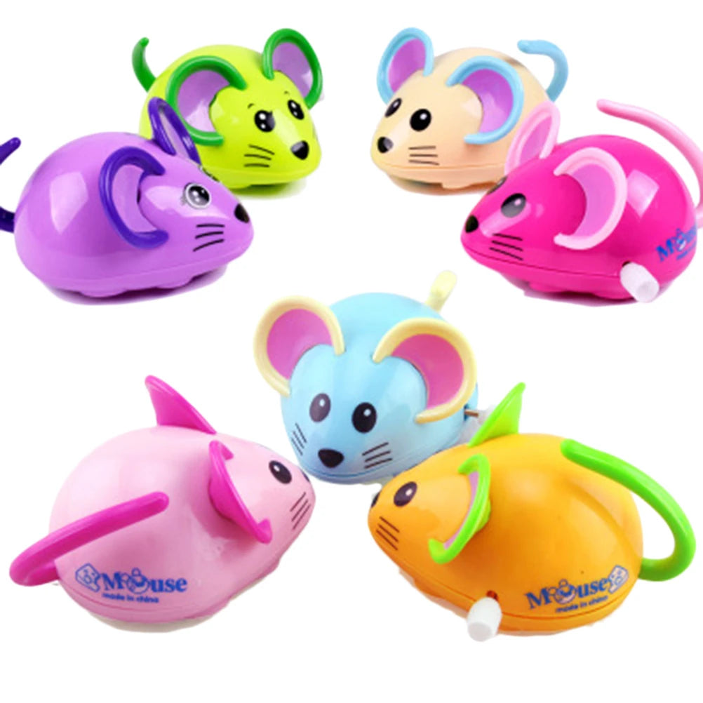 Six cartoon mouse wind-up toys in purple, green, cream, pink, blue and orange