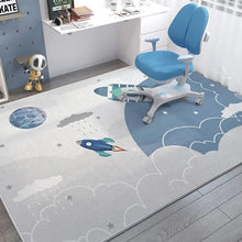 Children's room with a blue chair on a space-themed rug