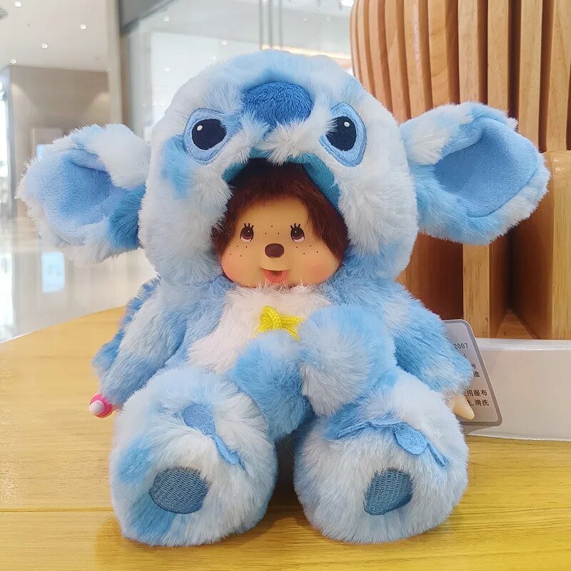 Blue plush toy with a small doll inside on a wooden surface