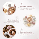 Baby teething ring with rounded corners, color cognition features, and cute appearance on a light gray background.