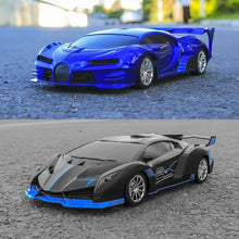 Two toy cars, one blue and one black with blue accents, on a road.