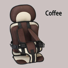 Children's car seat with brown and beige design on a gray background