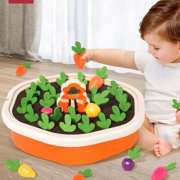 Child playing with the Montessori Colorful Shape Carrot toy garden set for toddler pretend play.