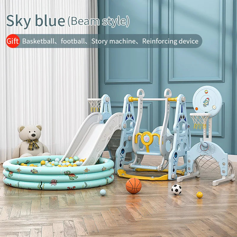 Children's play area with sky blue slide, swing set, and ball pit in a room.