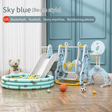 Children's play area with sky blue slide, swing set, and ball pit in a room.
