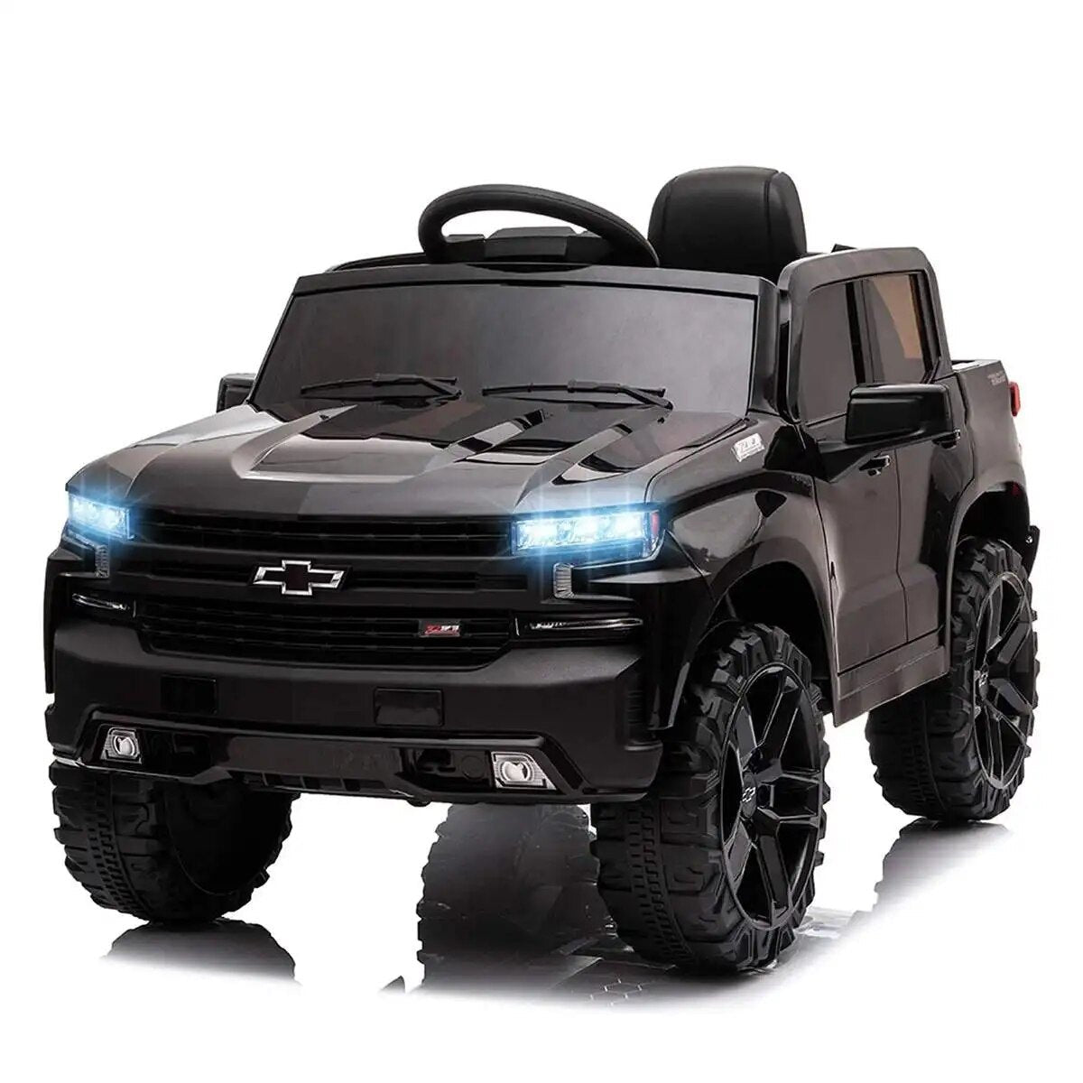 Black toy truck with glowing headlights 