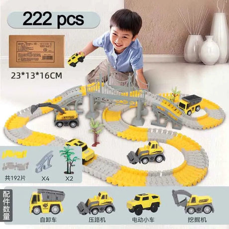 Child playing with a toy construction track set on a white surface.