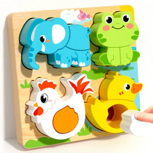 Elephant, frog, chicken and duck wooden puzzle board with a hand placing a white piece