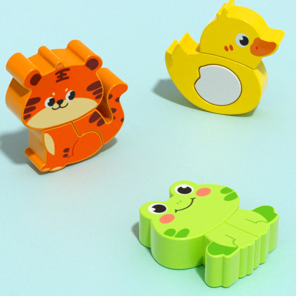 Three chunky wooden puzzle pieces: a tiger, a duck and a frog