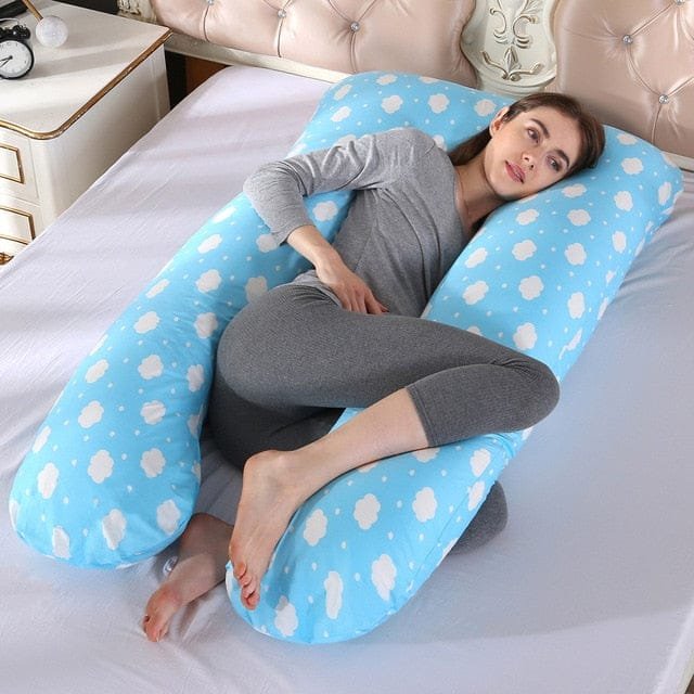 Sleeping Support Pillow in cloud blue, a U shaped sleep support for pregnancy comfort and back relief.