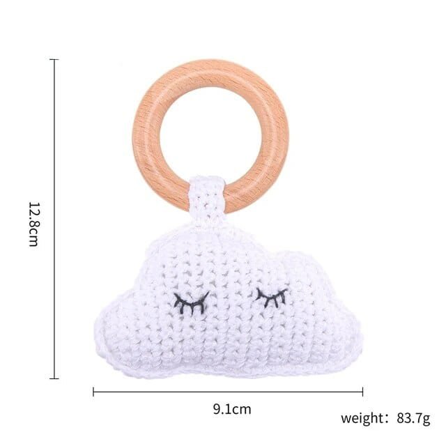 Cloud crochet baby rattle and teether wooden ring, a soothing nursery toy for newborn play and gentle teething.