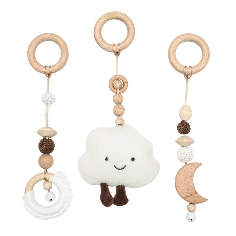 Cloud design wooden baby teether and rattle for calming sensory play and teething support.