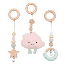 Cloud and star wooden baby teether for the activity gym, easing teething and encouraging grasping.