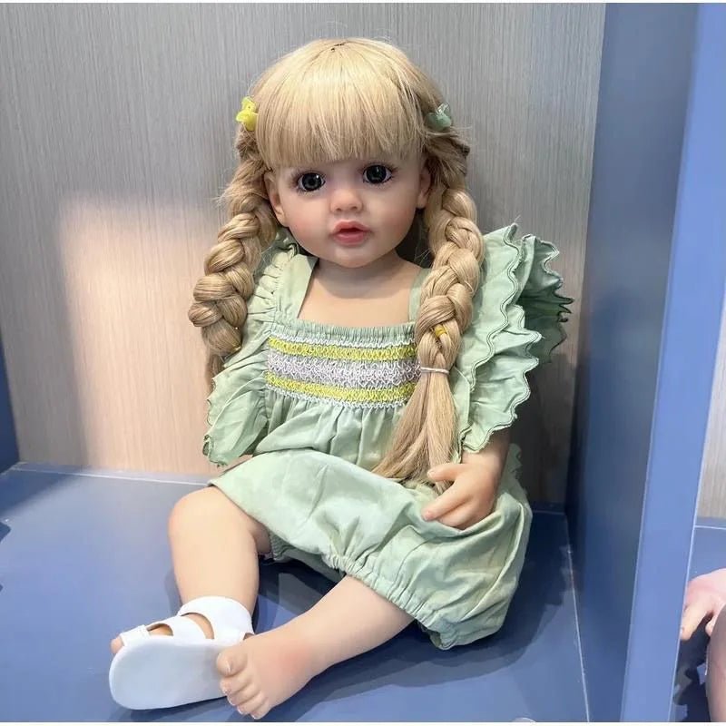 Collectible full silicone Reborn Doll Betty Princess with blonde hair and green dress for keepsake collecting and gifting.