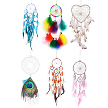 Collection of colorful rattan dream catchers with feathers for boho home decorating.