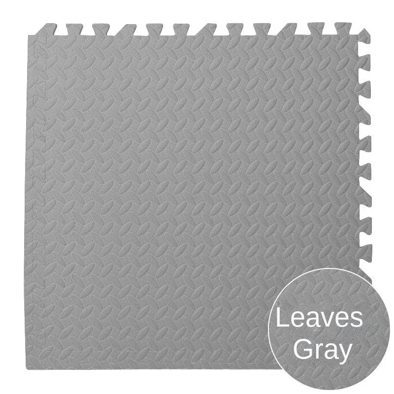 Gray interlocking foam mat with textured pattern.