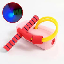 Colorful toy with red handles and yellow ring